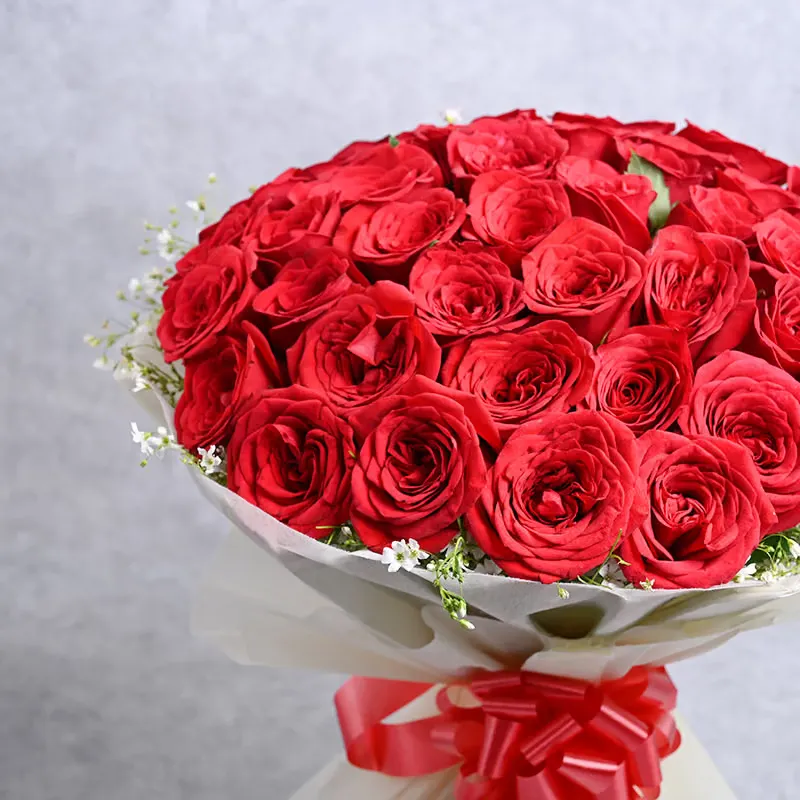 Romance in Scarlet Hues – 50 Red Roses Bouquet - Image 4